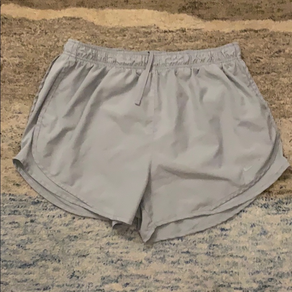 Solid grey Nike tempo shorts.